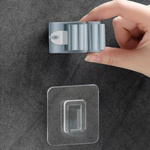 WIESZAK SAMOPRZYLEPNY UCHWYT NA SZCZOTKĘ MOPA KIJA BEZ WIERCENIA ŚCIENNY